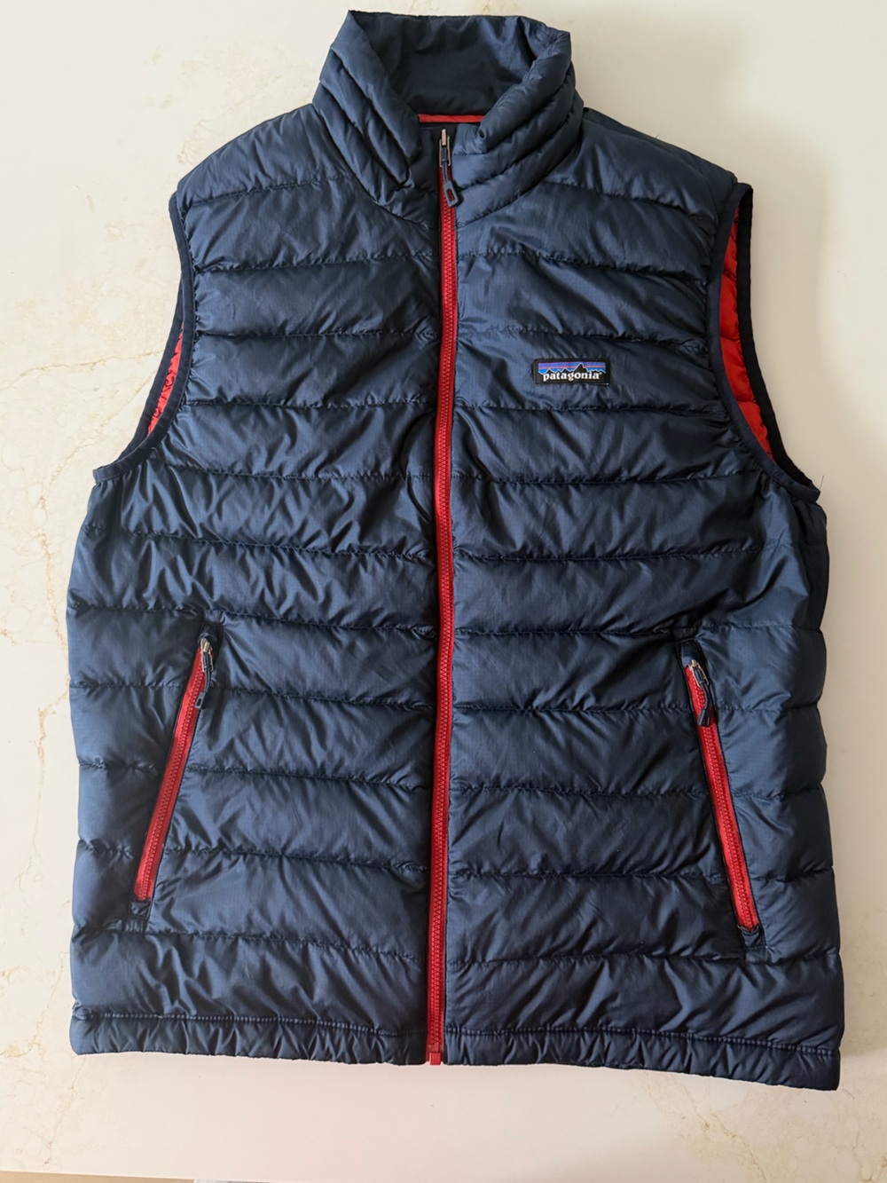 Patagonia Navy Quilted Vest with Red Zip Accents